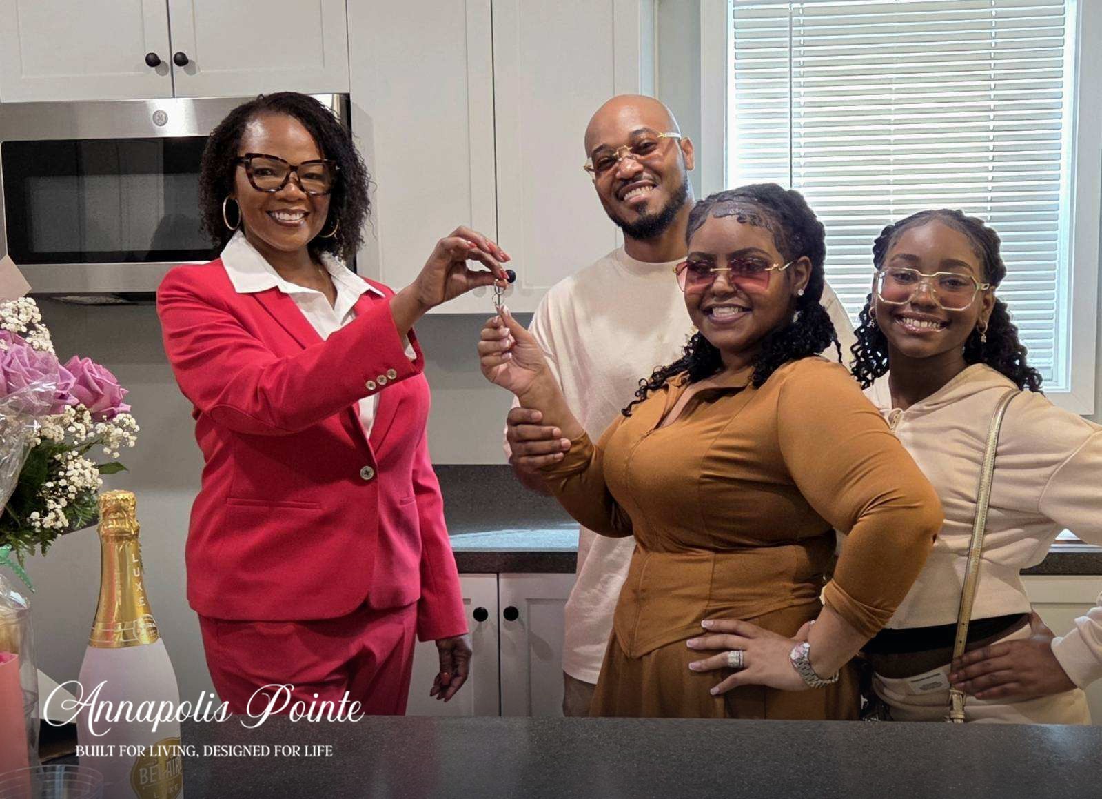 Homeowners celebrating their closing day at an Annapolis Pointe home